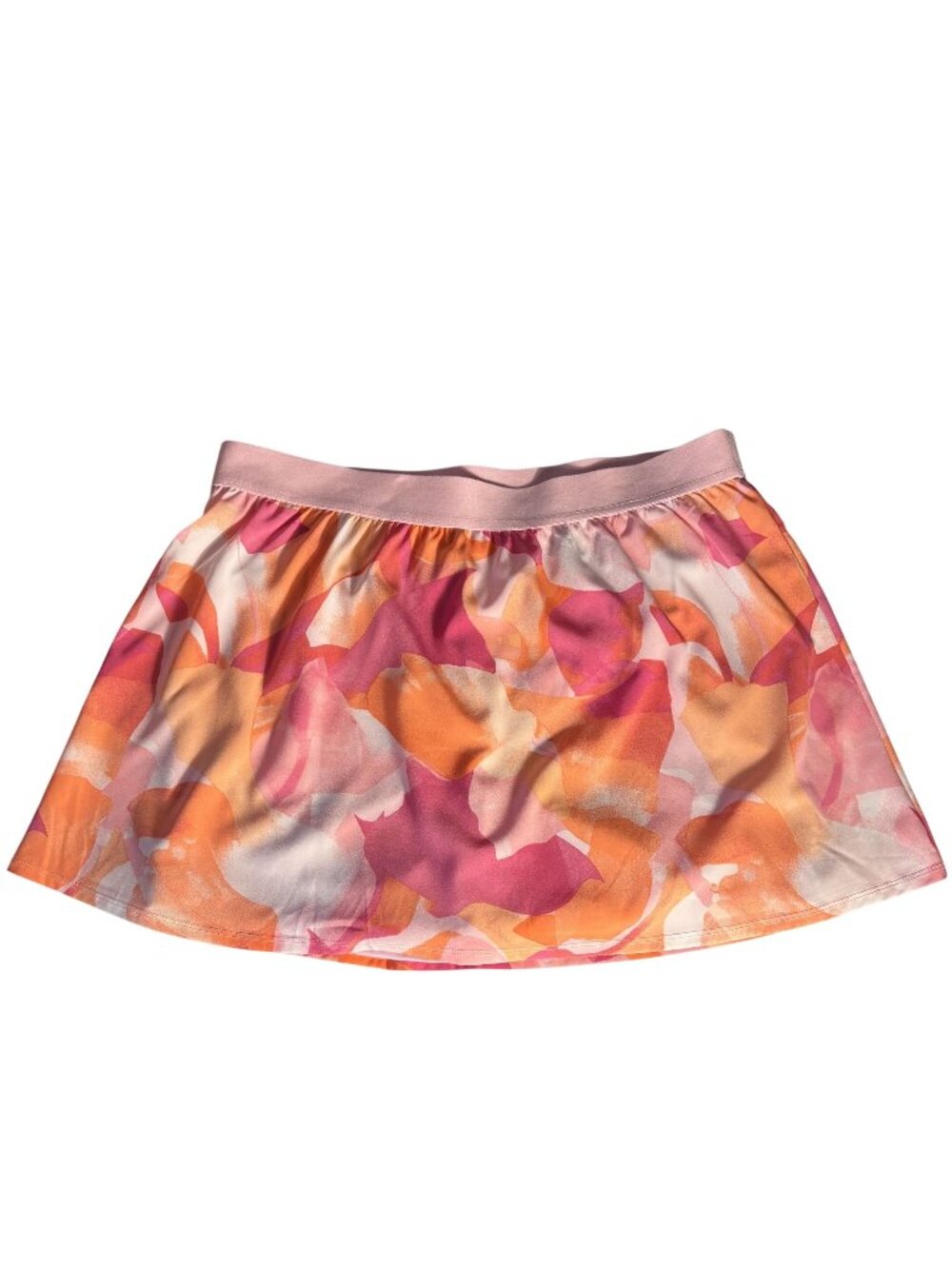 This Ideology skort features a vibrant "Petal Berry Ice" painterly floral print